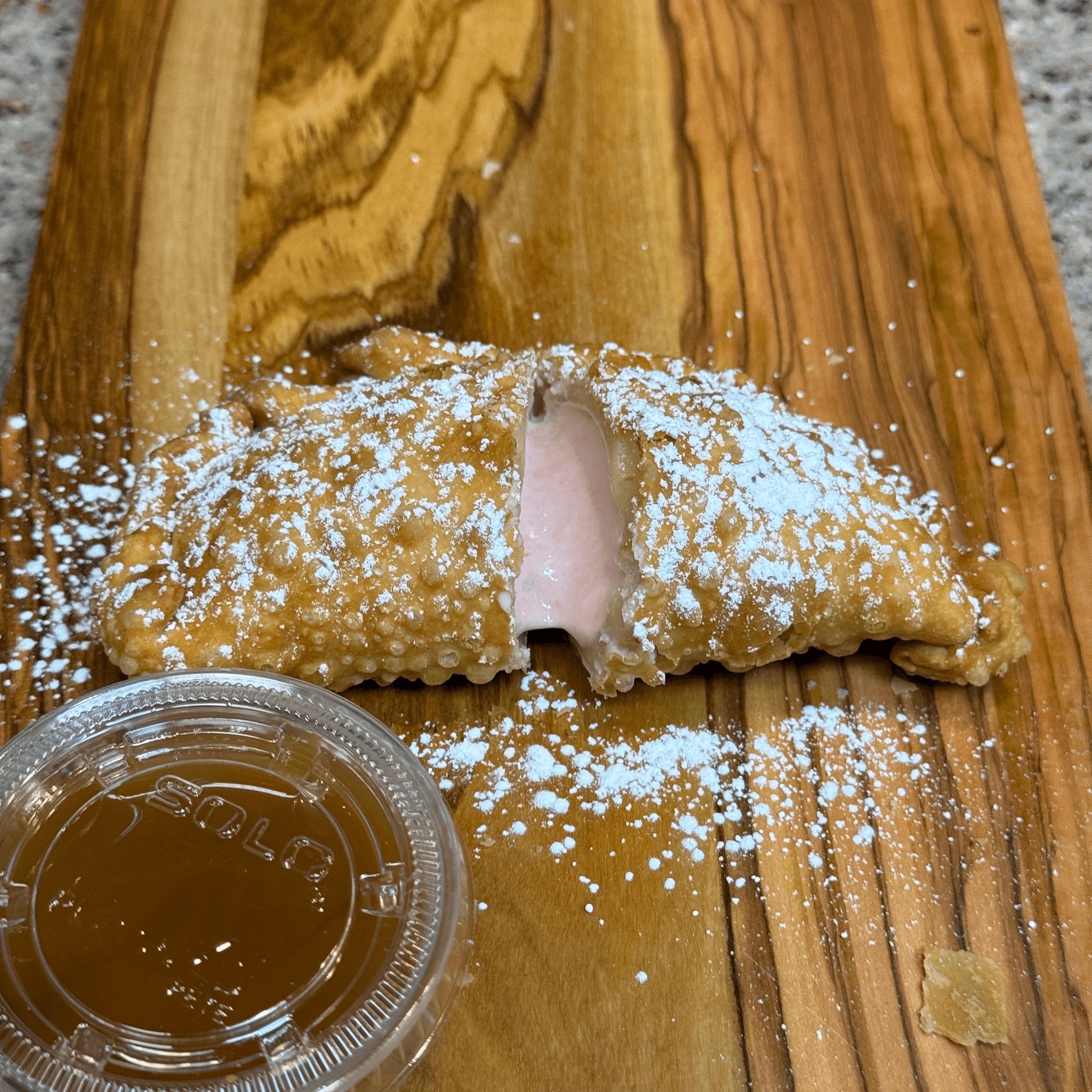 Strawberry Cheesecake Empanada.